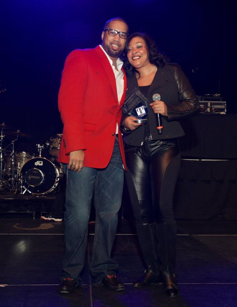 Lady B presents Walt Reeder, Jr. his award