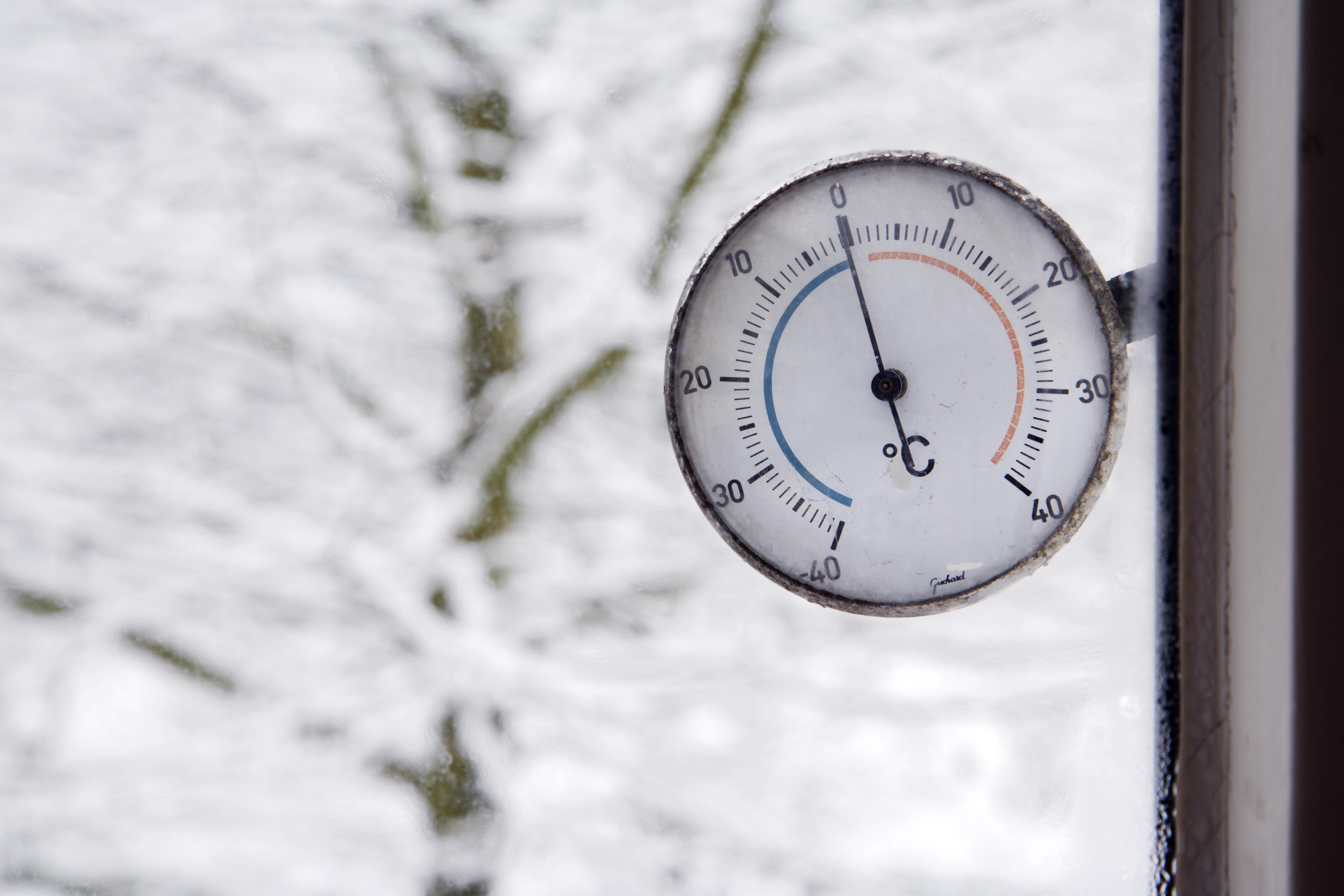 close-up of thermometer outside window
