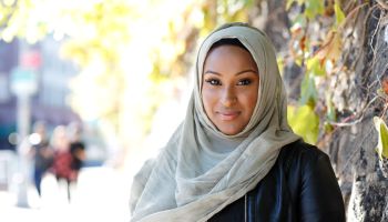 Happy, young, Muslim Female in Urban Setting