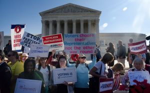 Activists Demonstrate Outside Supreme Court As Court Hears Case To Challenging Practice Of Partisan Gerrymandering