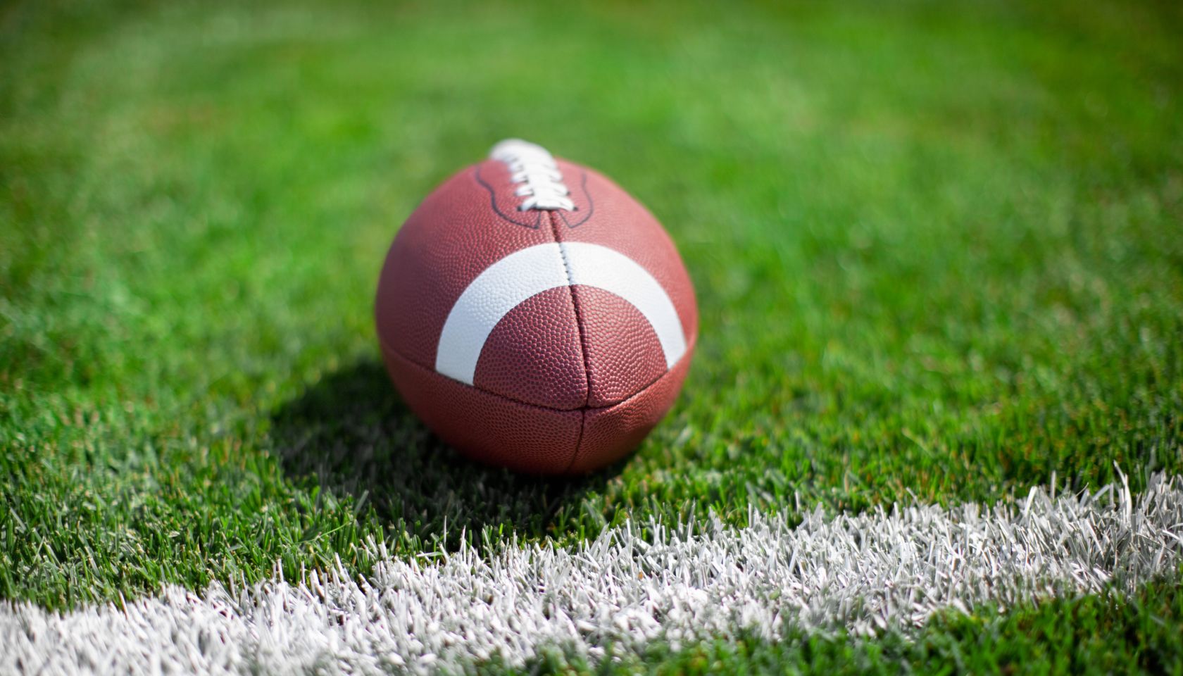 Close-Up Of American Football Ball At The Edge