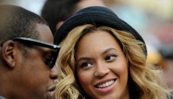 Entertainer Jay-Z (L) and wife Beyoncé (