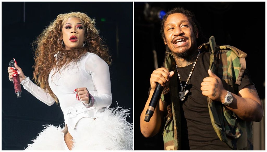 Two performers on stage: a woman with curly hair singing into a microphone, and a man with dreadlocks holding a microphone.